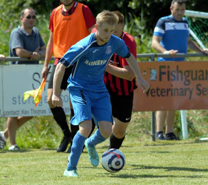 Adam John in action against Goodwick scored the winner for Hakin at Cwmamman United